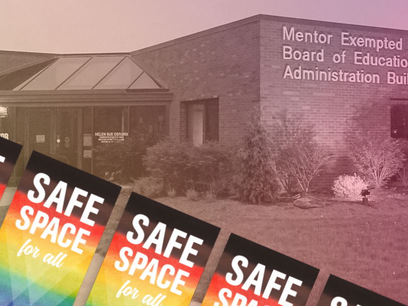 Mentor Public Schools' Board of Education office is desaturated with a rainbow gradient shining from a line of colorful Safe Space for All cards.